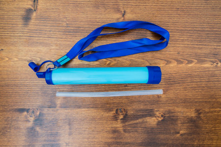 Portable water purifier filter with the option to use it directly in water or attach a bottle to the...
