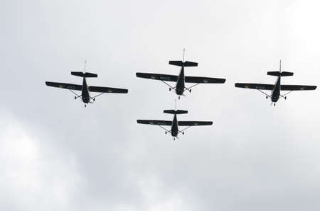 A group of Four Black Fighter Aircrafts from Behind