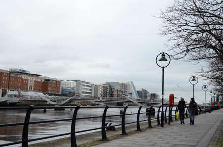 SeÃ¡n O'Casey Bridge and Walk Path along The River Liffey in Dublin, Irelandのeditorial素材