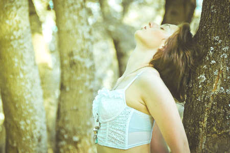 Young woman in parkの写真素材