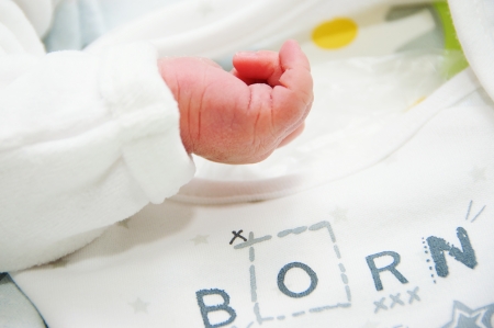 Newborn baby's handの写真素材