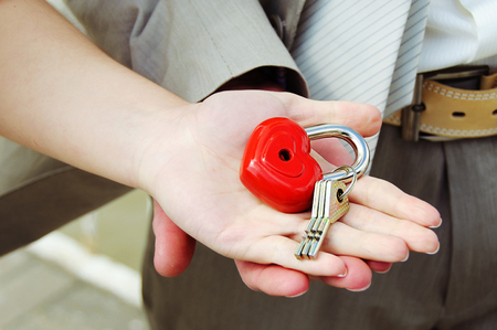 The lock with keys at the groom and the brideの写真素材