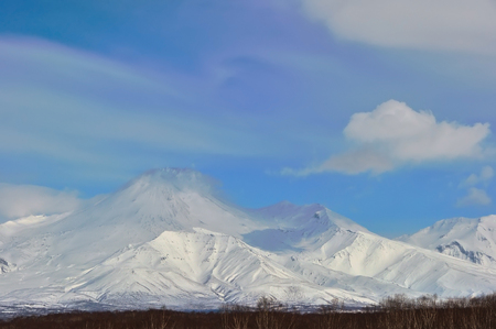 Kamchatka: winter view of eruption active Volcano. Russiaの写真素材