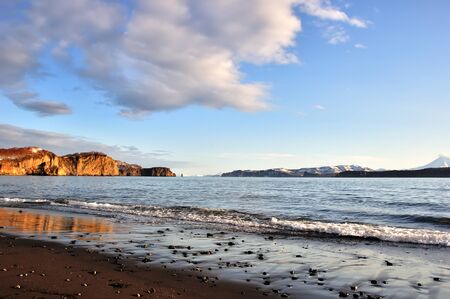 Rocks in sea in Russia and blue skyの写真素材