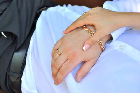 Happy bride and groom on their wedding huggingの写真素材