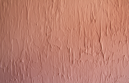 the background is made of a texture of Venetian plaster color with a relief surfaceの写真素材