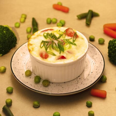 casserole with a cheese close up on a table on a rustic kitchen. Concept helphy foodの写真素材