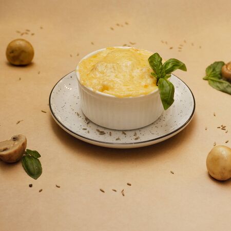 casserole with a cheese close up on a table on a rustic kitchen. Concept helphy foodの写真素材