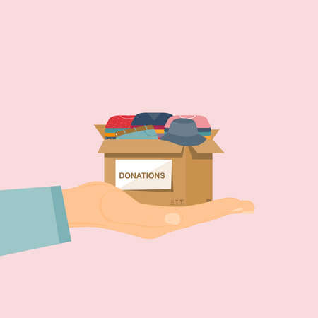 Cardboard box for donations with clothes in hand. The concept of social and humanitarian assistance, volunteering and charity. Vector illustration in a flat style.のイラスト素材