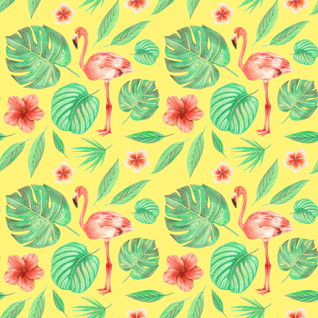 hand drawing tropical leaves, flowers and birds. flamingo in the tropics. seamless pattern on a yellow backgroundの写真素材