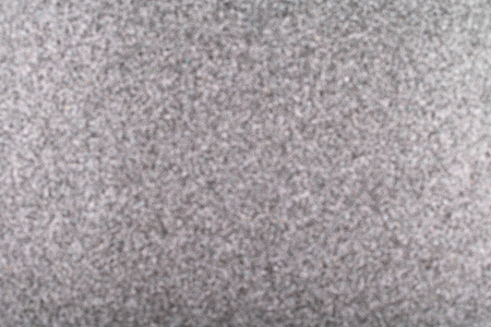 Grey blurred abstract background, tiny bokeh texture .の写真素材