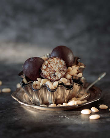 Pine nut candies with a chocolate vertical