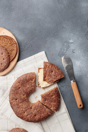 Reikaleipa - traditional finnish rye bread on a gray concrete background