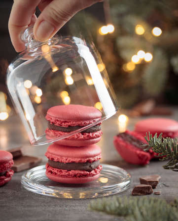 Sweet dessert - red christmas macaroons on a gray backgroundの写真素材