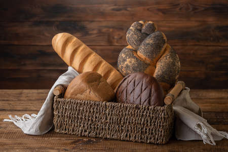 Natural bread loaf on wooden backgroundの写真素材