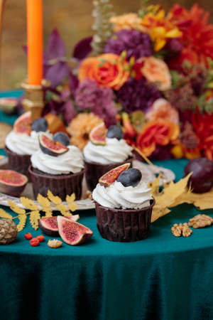 Autumn sweet dessert decorated on a table in the park
