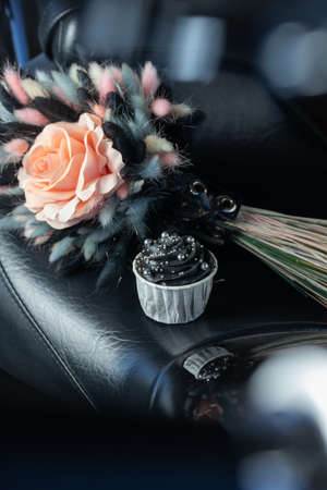 Grunge style cupcakes with black and pink cream verticalの写真素材