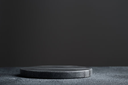 Empty marble plate for dessert on dark background. Horizontal banner with a copyspaceの写真素材