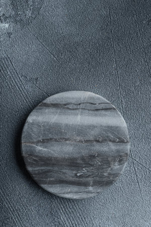 Empty marble plate for dessert on dark background, top view. Vertical banner top view with a copyspaceの写真素材