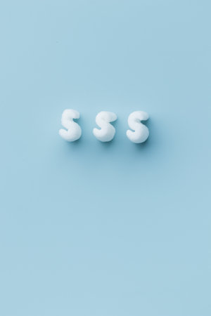 granules for filling boxe - reliable protective packaging solution, environmental friendly, fireproof and durable, shock-absorbing filler. Banner on a blue background with copyspaceの写真素材