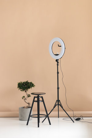 Photo studio with lighting equipment. light and chair