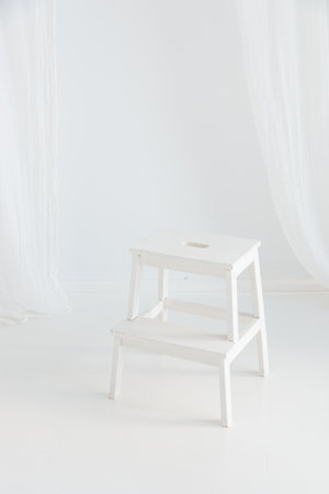 White empty chair with a white backgroundの写真素材