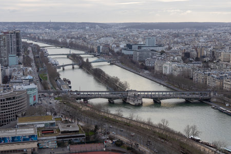 Paris city panorama with river Seine and bridges, the aerial view from the Eiffel tower in soft evening lightの写真素材