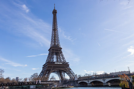Paris, France - February 23, 2025: Eiffel Tower on the Seine River in Paris, France, early spring.の写真素材