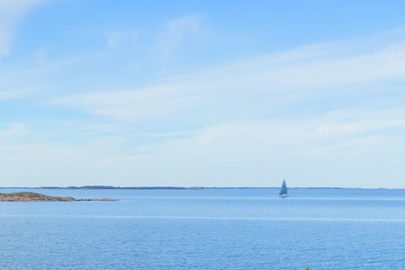 Scenic view of the Baltic Sea, concept of eco-tourism, travelling. Clean waters, natural coastline, and sustainable travel harmony with Finnish nature, marine environmentの写真素材