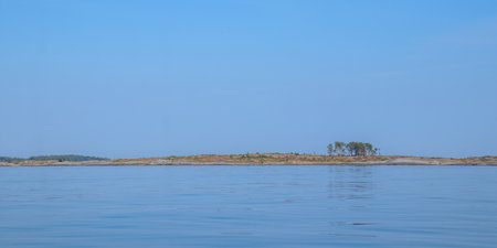 Scenic view of the Baltic Sea, concept of eco-tourism, travelling. Clean waters, natural coastline, and sustainable travel harmony with Finnish nature, marine environmentの写真素材