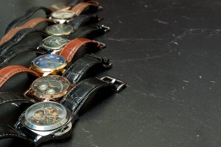 men's wrist watches collection at dark backgroundの写真素材