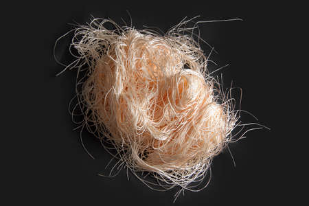 Tangled bright, lightweight threads for needlework. Knitting yarn closeup Handemade.