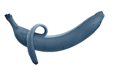 Peeled banana horizontally, close-up isolated on a white background, tinted in classic blue, trend 2020.の写真素材