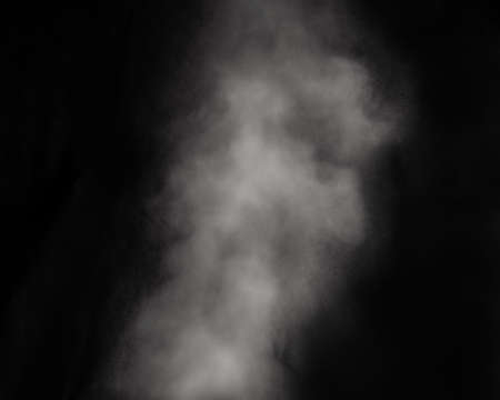 White smoke isolated on black background. smoke stock image.の写真素材