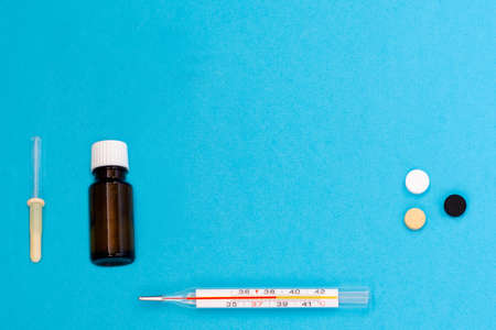 Medical products for the treatment of diseases on a blue background. Top view. Copy space. Flat lay/の写真素材