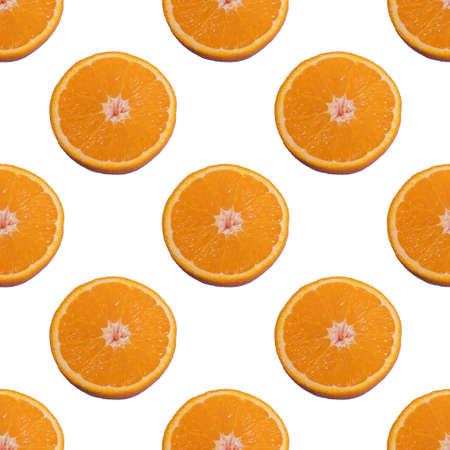 Seamless pattern from half an orange isolated on white background. Minimal, food texture. Fruit backgroundの写真素材