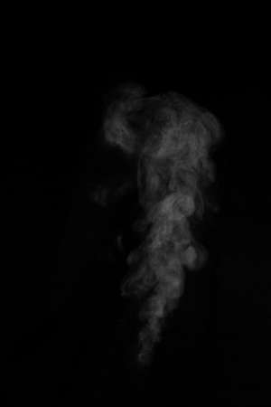 White smoke isolated on a black background. smoke image is like a ghost.の写真素材