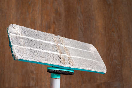 House cleaning concept. Dirty mop after washing the floor, close-up. Cleaning and disinfection.の写真素材
