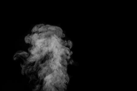 Smoke fragments on a black background. Abstract background, design element, for overlay on picturesの写真素材