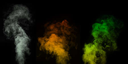 A set of multi-colored different vapors, smoke on a black background to overlay on your photos.の写真素材