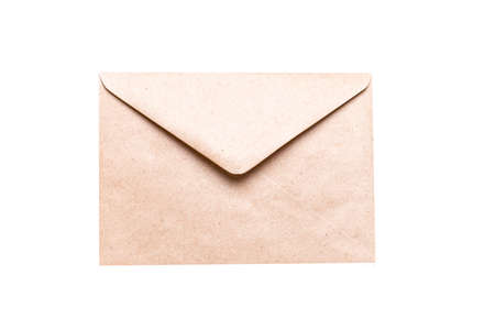 Closed brown craft envelope isolated on white background. An envelope for your congratulationsの写真素材