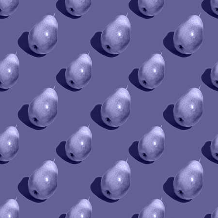 Trendy seamless pattern of toned pears isolated on Very Peri color 2022. Trending color 2022....