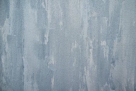 Texture blue gray plastered wall for background. Texture of a gray concrete wall. Rough painted...