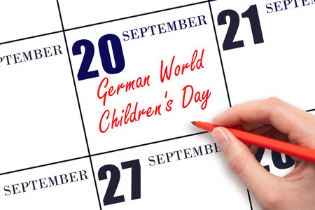 September 20. Hand writing text German World Childrens Day on calendar date. Save the date. Holiday. Important date. Day of the year concept.の写真素材