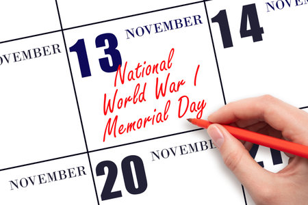 November 13. Hand writing text World War I Memorial Day on calendar date. Save the date. Holiday. Important date. Day of the year concept.の写真素材