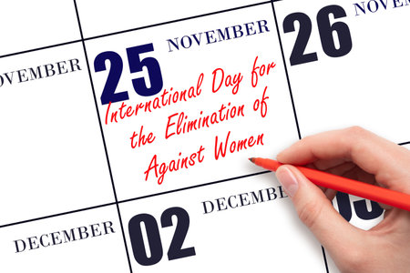 November 25. Hand writing text International Day for the Elimination of Violence Against Women on calendar date. Save the date. Holiday. Important date. Day of the year concept.の写真素材