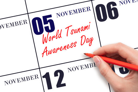 November 5. Hand writing text World Tsunami Awareness Day on calendar date. Save the date. Holiday. Important date. Day of the year concept.の写真素材