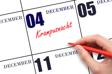 December 4. Hand writing text Krampusnacht on calendar date. Save the date. Holiday. Day of the year concept.の写真素材
