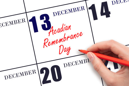 December 13. Hand writing text Acadian Remembrance Day on calendar date. Save the date. Holiday. Day of the year concept.の写真素材