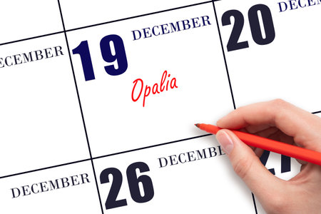 December 19. Hand writing text Opalia on calendar date. Save the date. Holiday. Day of the year concept.の写真素材
